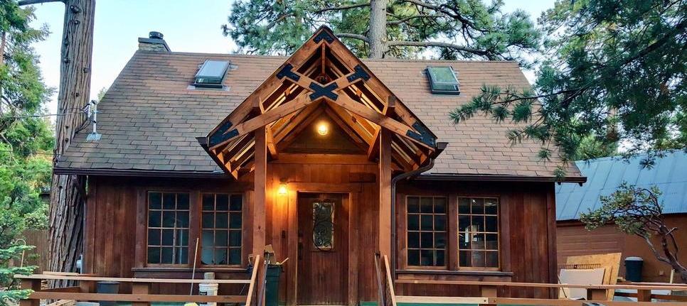 Black steel decorative timber truss plate on a porch in California