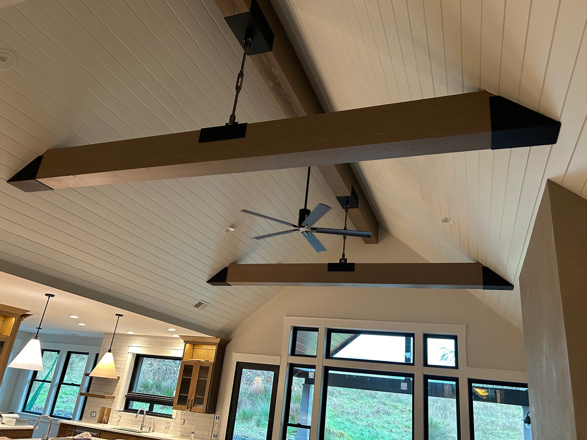 Great room with tie rod vertical supports and heavy duty beam brackets