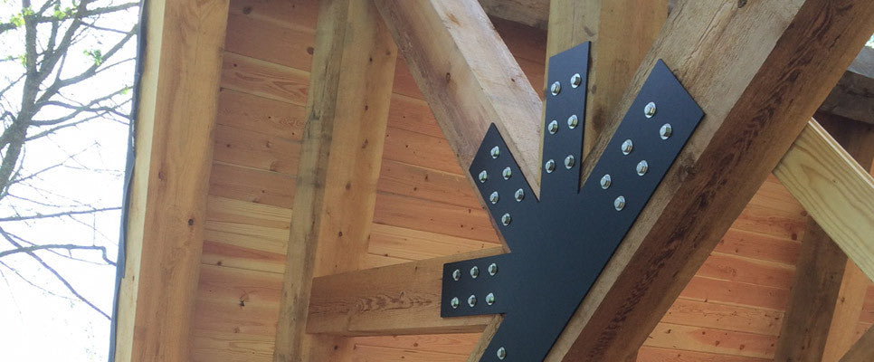 Decorative steel truss fan plate from our Sierra line used for an outdoor living area